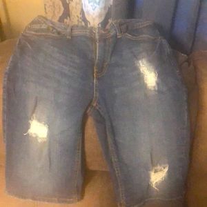 Boys ripped blue jeans